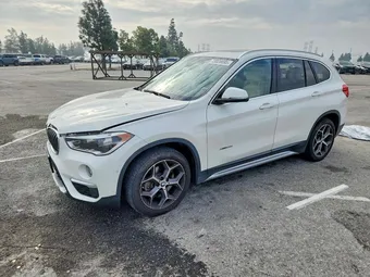 2016 BMW X1 WBXHT3C3XGP889184