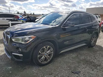 2017 BMW X1 WBXHT3Z35H4A52145 Lot 77804035