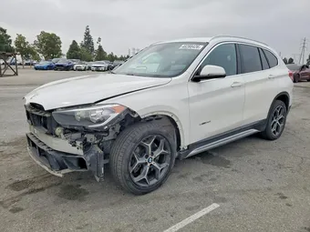 2018 BMW X1 WBXHU7C3XJ5H39408