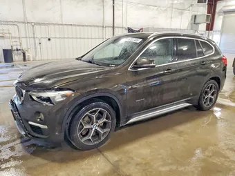 2016 BMW X1 WBXHT3C3XGP883983