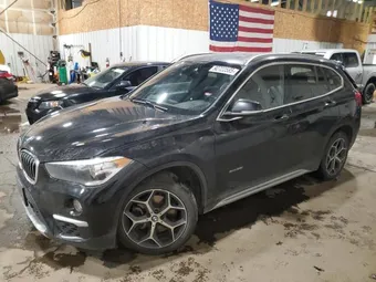 2017 BMW X1 WBXHT3C35H5F87284