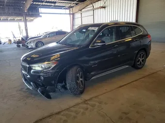 2016 BMW X1 WBXHT3C31GP884035