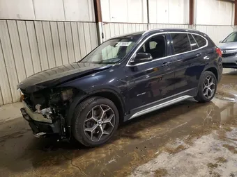 2016 BMW X1 WBXHT3C31GP883886